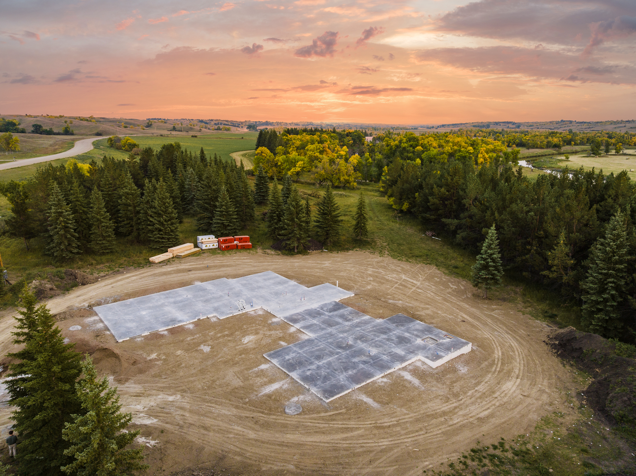 Aerial sunset view of completed foundation slabs