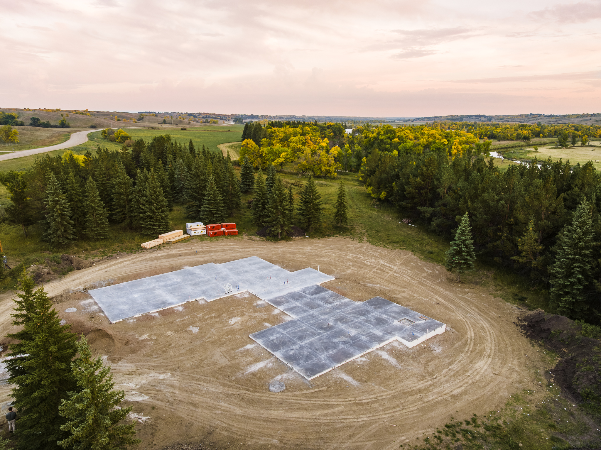 Sunset aerial view of two completed concrete slabs